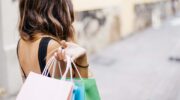 Lady with shopping bag representing the Retail and Sales Voiceover article.