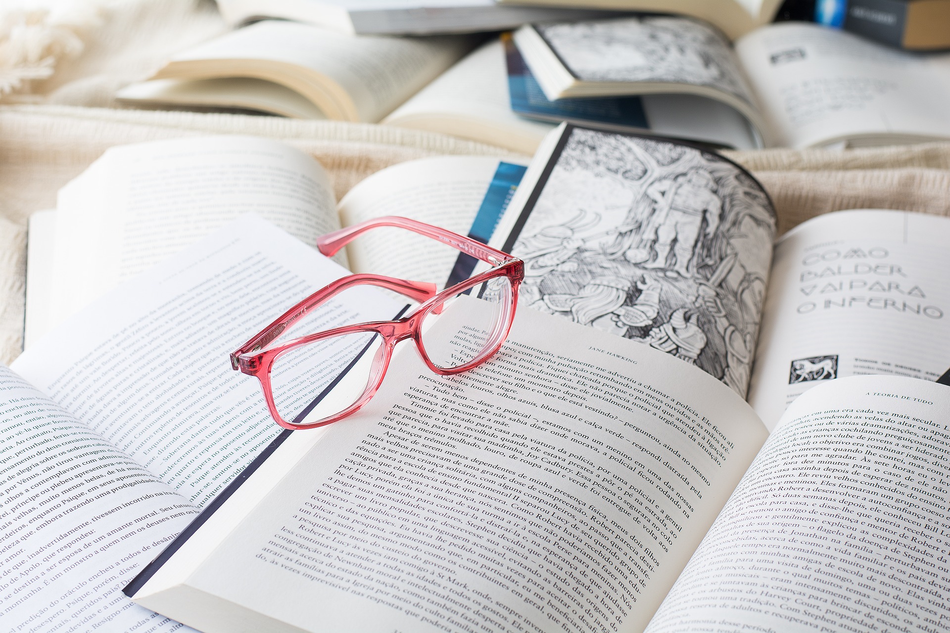 Books and glasses representing learning for the Educational Voiceover article.